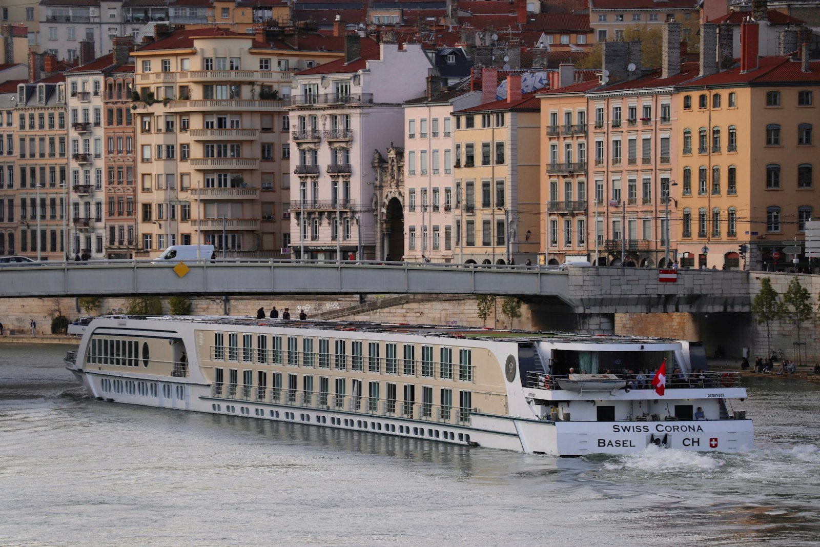 River cruise sailing through a European city